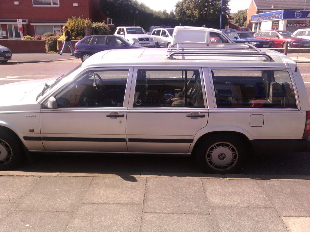 here we have a Volvo 740 its white it stands out from other cars it makes