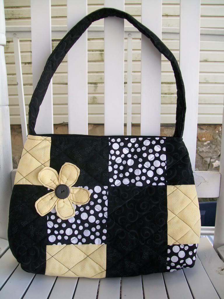 Black and yellow Flare bag