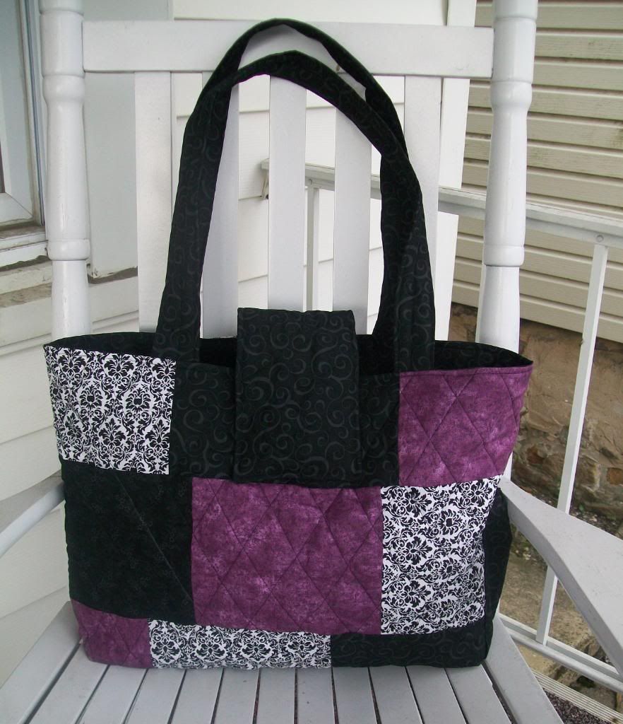 Black, white and purple Diaper Bag