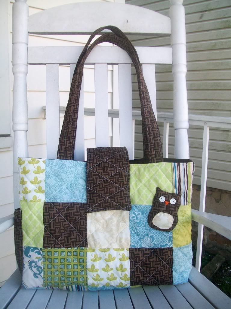 Brown, blue and green patchwork diaper bag with owl